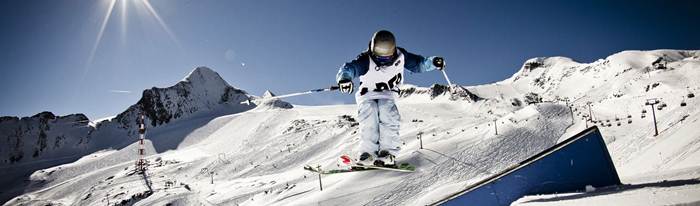 Skier at a funpark in the moutains